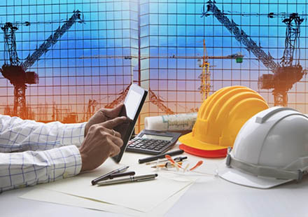 Hand Of Architect Working On Table With Tablet Computer And Work